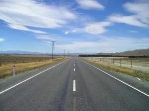 A straight roadmap stretching off into the distance. The journey to a successful product is never straight like this.