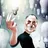 Steve Jobs reaching out to light a bulb by touching it, (by Andre Carrilho)